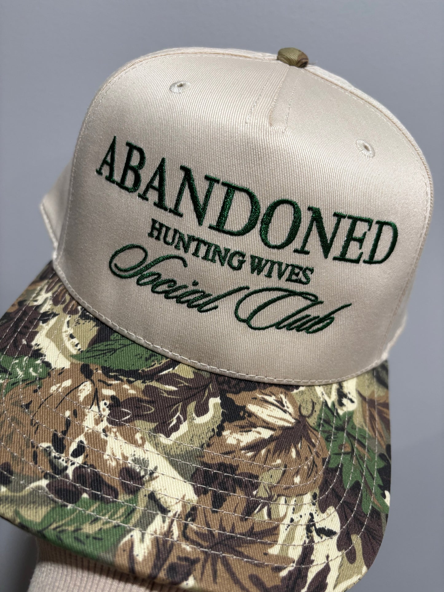 Abandoned Wives Trucker Hat