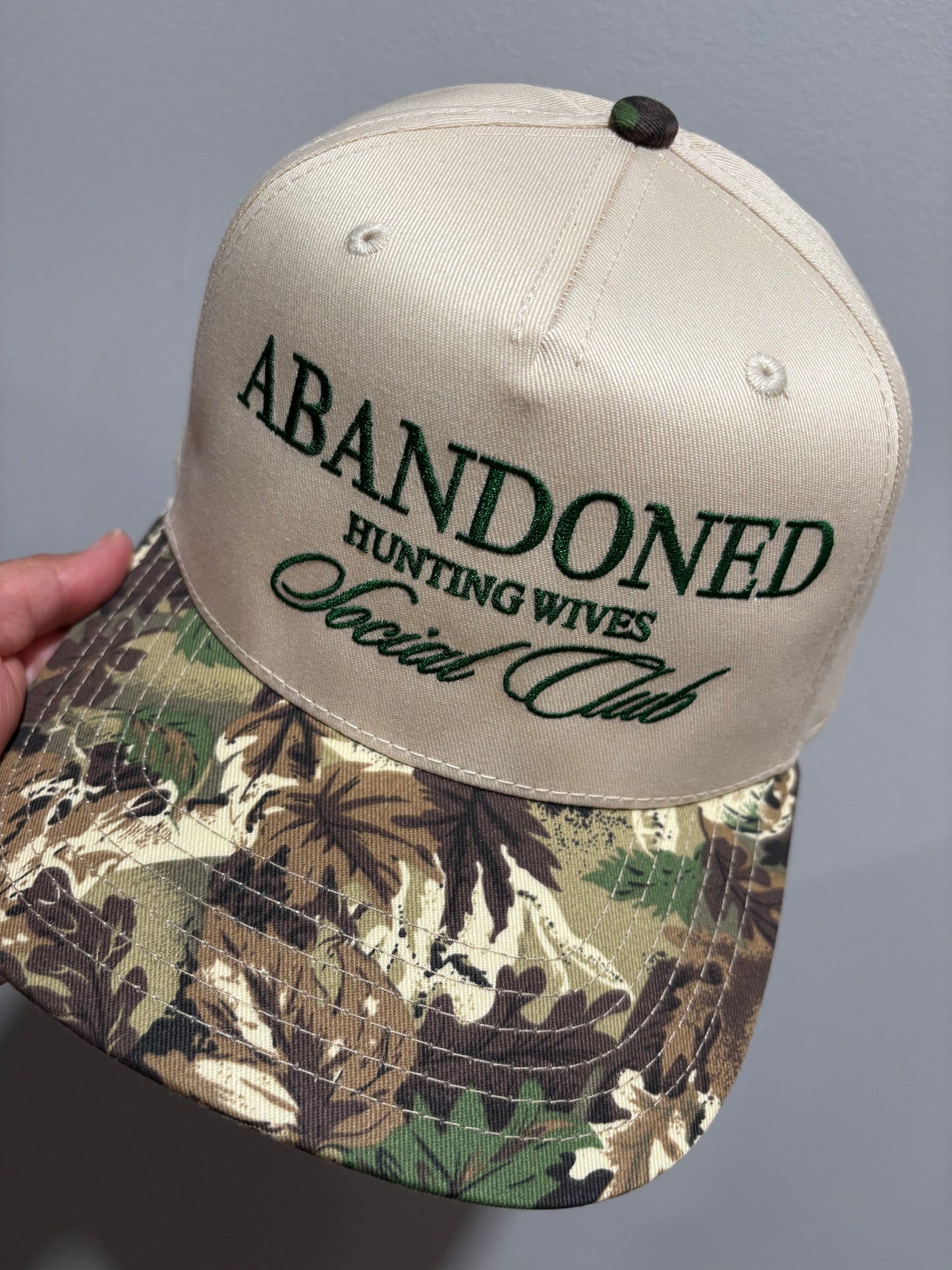 Abandoned Wives Trucker Hat